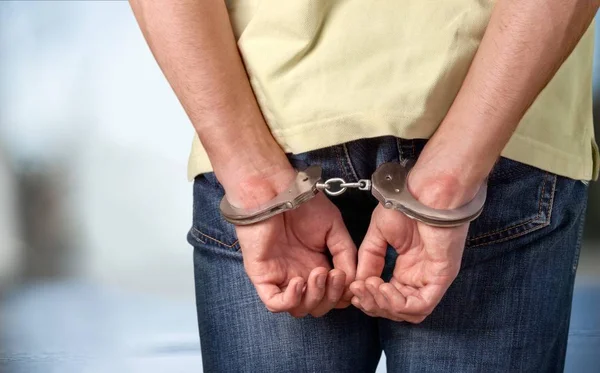 Sentencia ejemplar: Prisión de por vida por secuestro exprés de 2 operadores en México-Querétaro 1 depositphotos 161278470 stock photo man in handcuffs behind his